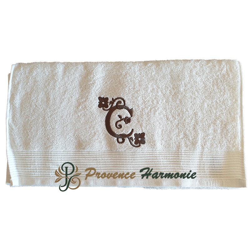 Embroidered toilet towel with letter C Embroidered toilet towel with letter C