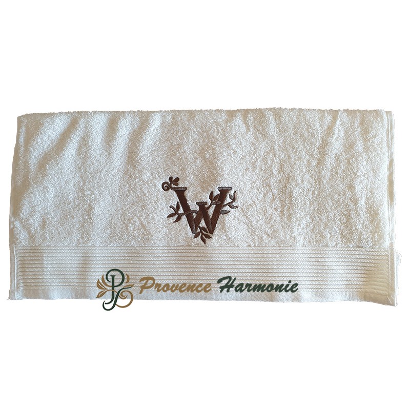 Embroidered toilet towel with letter W Embroidered toilet towel with letter W
